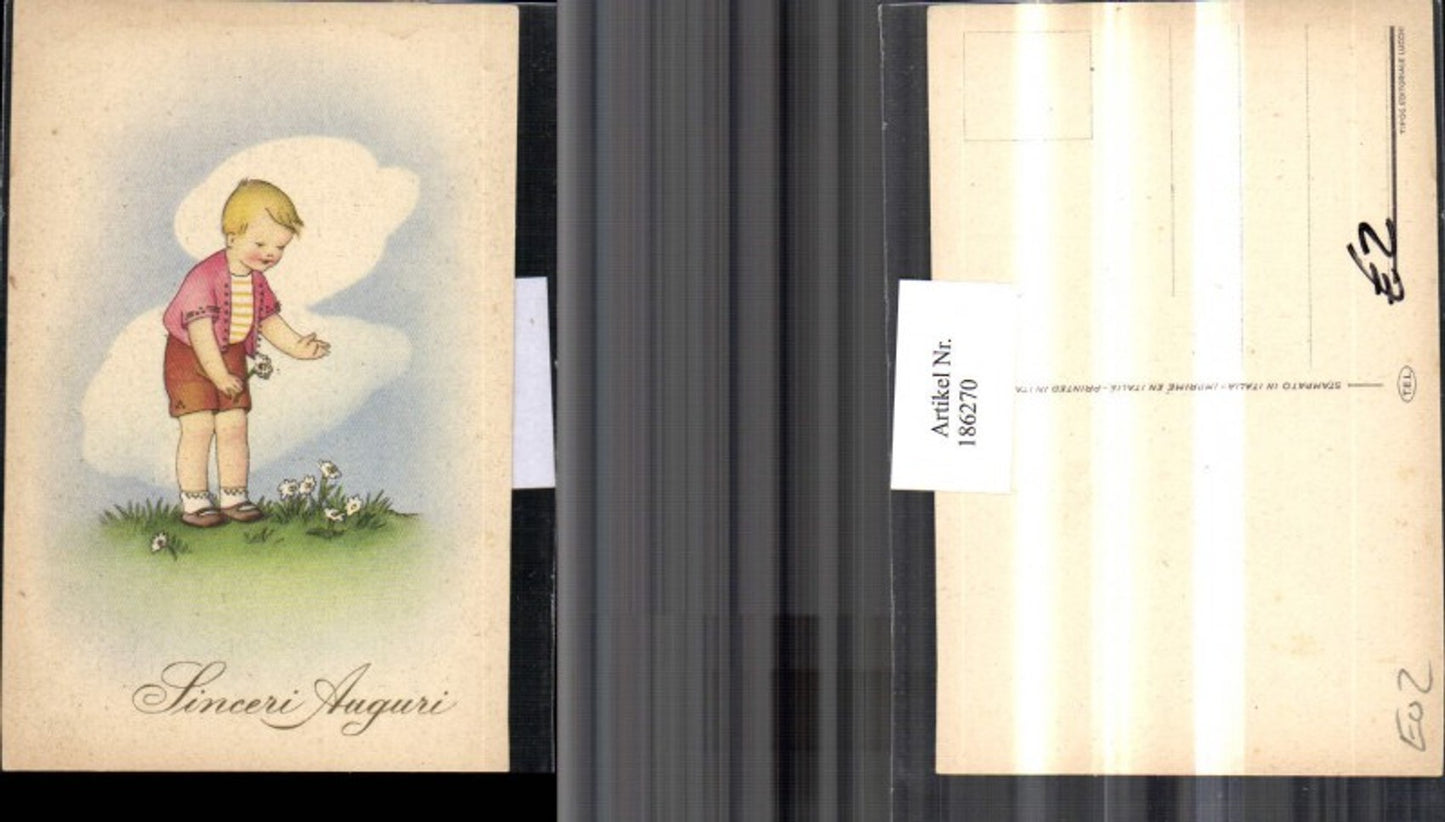 186270, Boy in a meadow with flowers