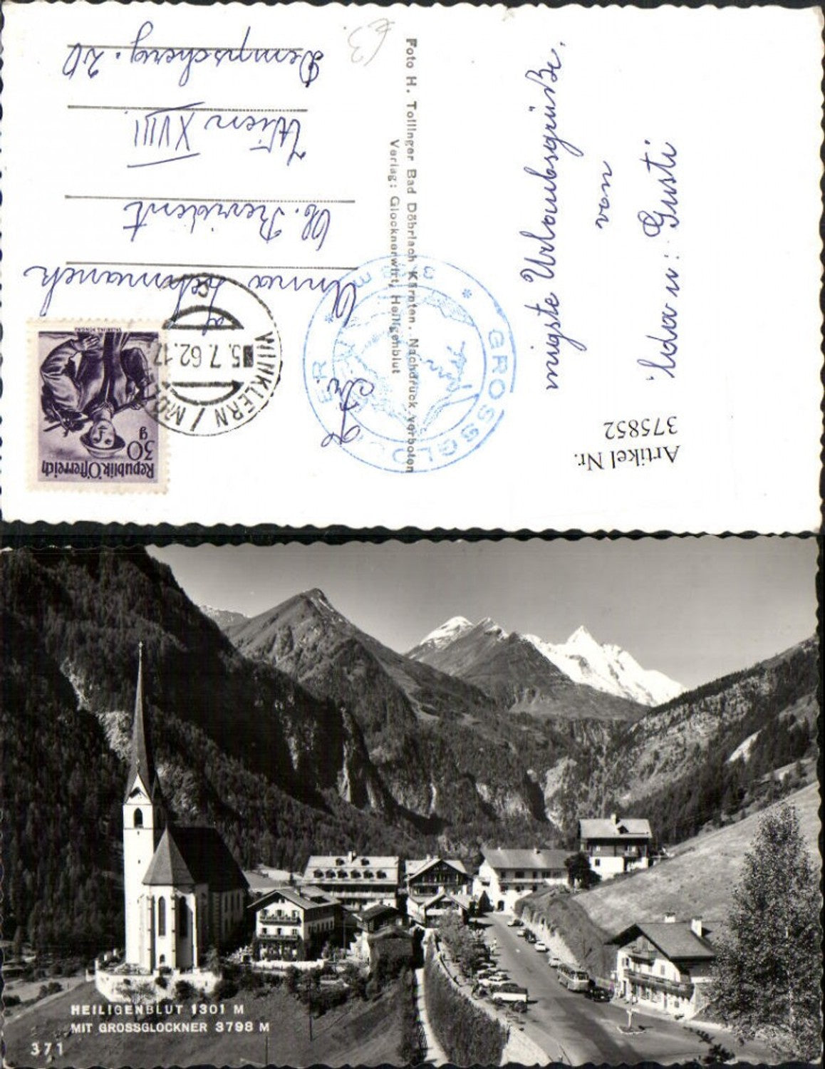 375852, Heiligenblut Partial view of church with Großglockner mountain backdrop