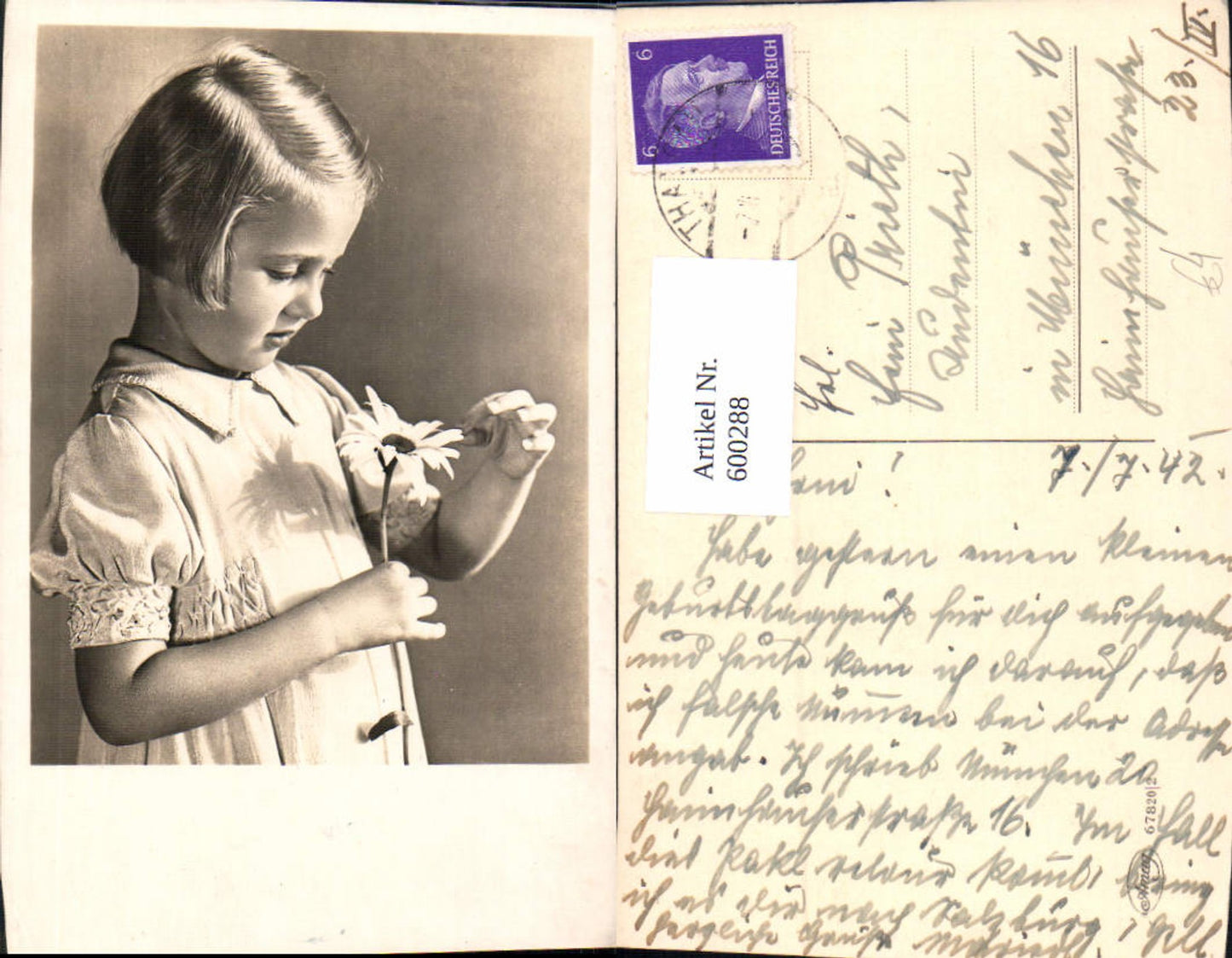 600288, Child Blonde girl with flower daisy
