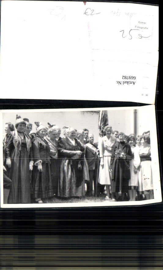 669782, Photo Ak Group picture Women traditional dress Gold bonnets Flag pub Photo Paula Witsch